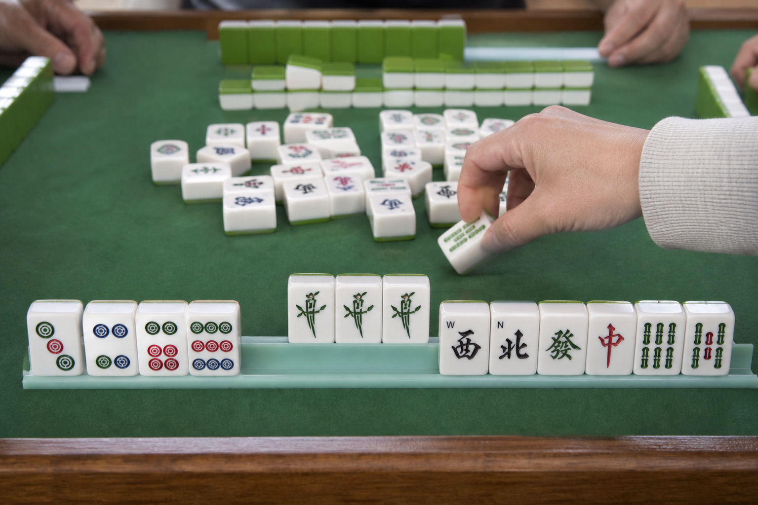Exposed Pung after claiming a discarded tile in American Mahjong