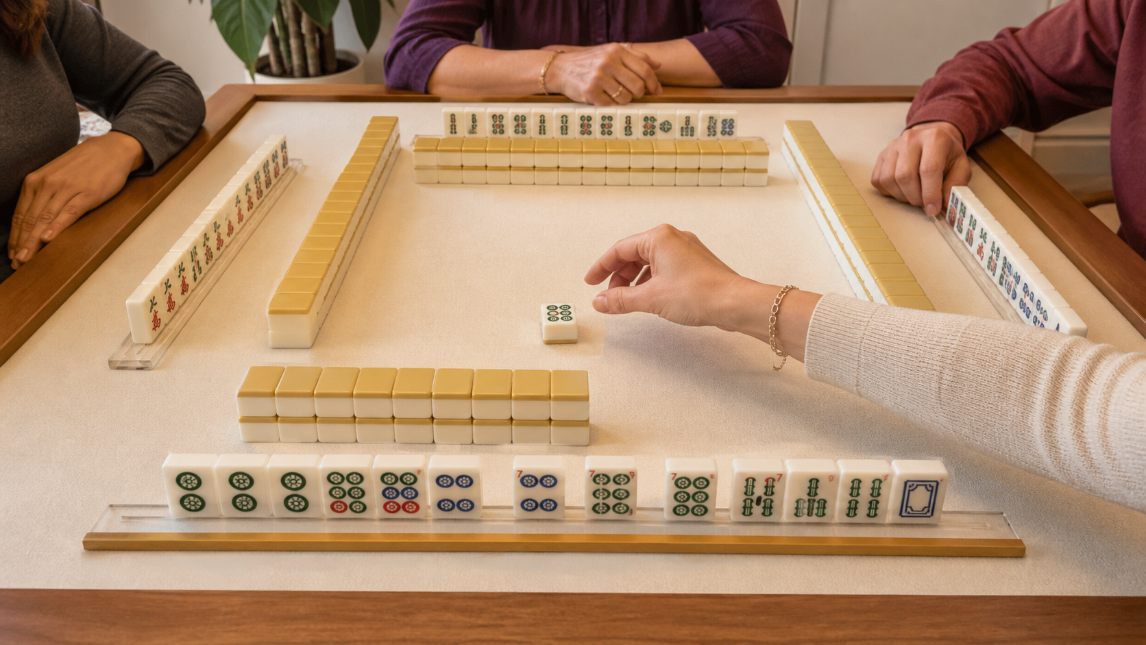 Player preparing to claim a discarded tile in American Mahjong
